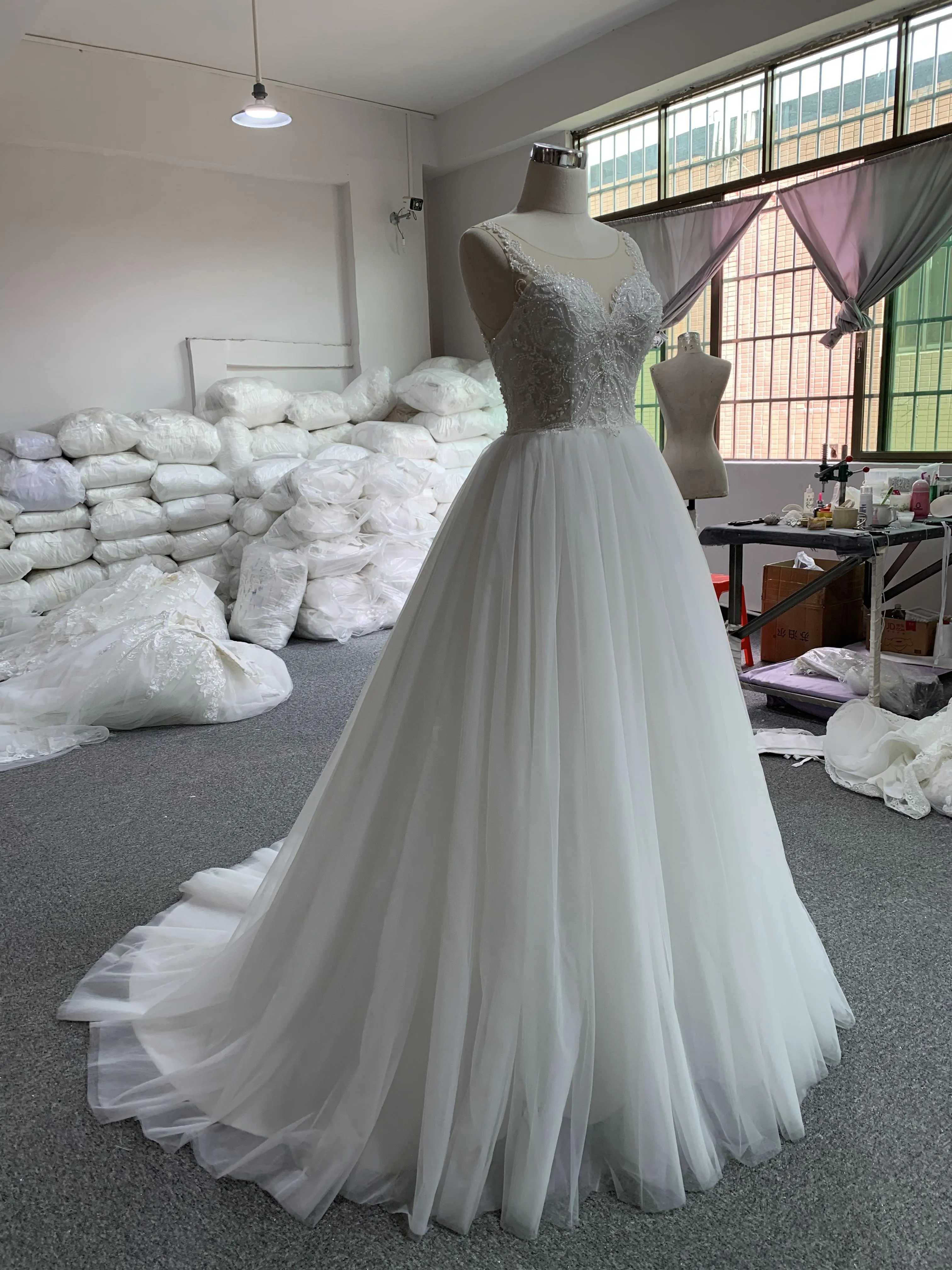 BYG spaghetti strap A line wedding dress