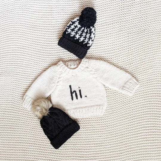 hi. CREW NECK SWEATER