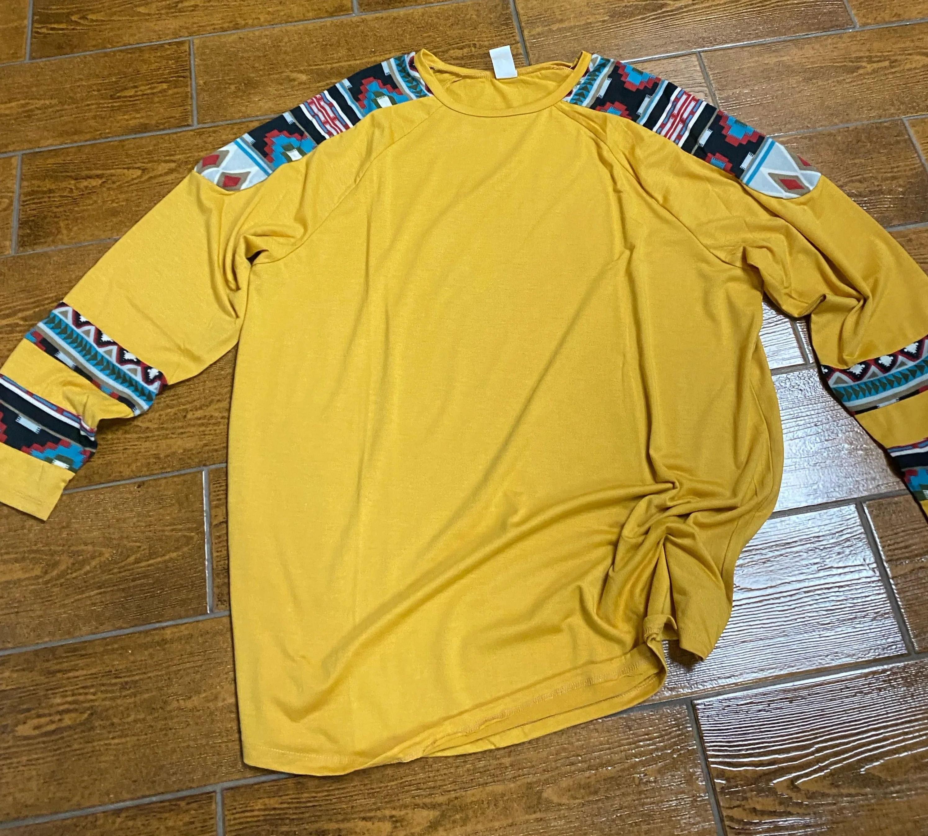 Yellow Shirt with Aztec Design on Sleeves